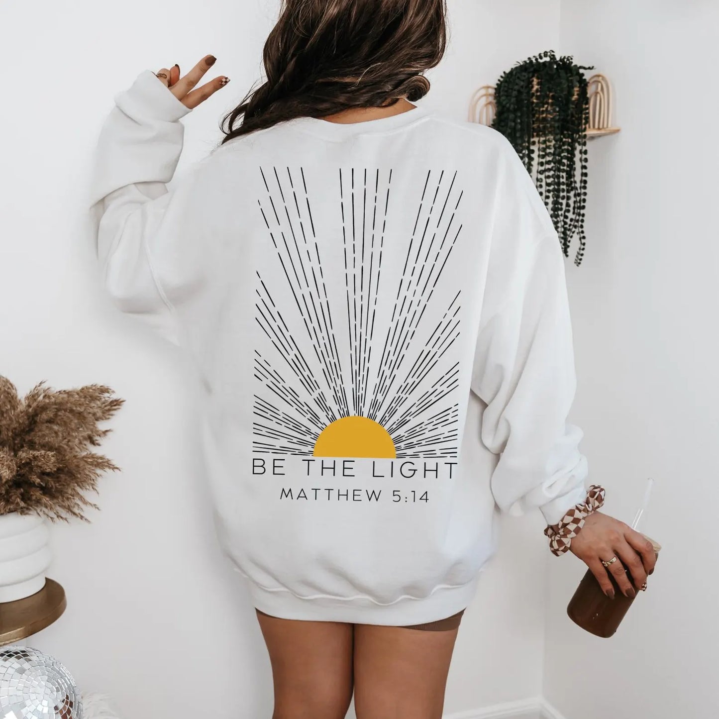 The Be The Light Sweater
