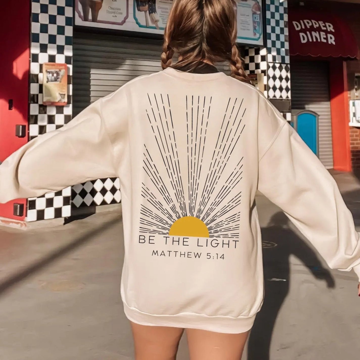 The Be The Light Sweater