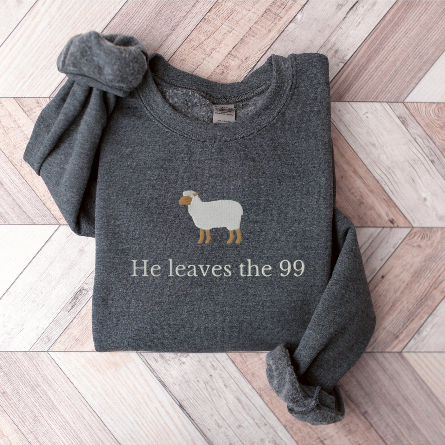 He Leaves The 99 Sweater